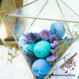 Nothing's Better Than A Springtime Pop Of Color - blue and green eggs with purple flowers in a geometric vase