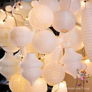 6 Decorative Lighting Ideas (Made With Paper)! Do it right! The Party Goddess, LA's full service event coordinator who makes any event ridiculously fab, dishes on decorative lighting ideas! Check it out at https://thepartygoddess.com/6-decorative-lighting-ideas-made-with-paper #maiasphoto #decorativelighting #eventlighting #paperlanterns - white paper lanterns image