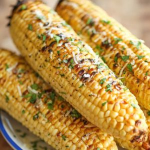 Ahh! Refreshing Ways To Spring Into Summer! The Party Goddess shares ideas and inspiration from her events to get you ready for your #summer #parties! Check it out at https://thepartygoddess.com/ahh-refreshing-ways-spring-into-summer - corn on the cob image
