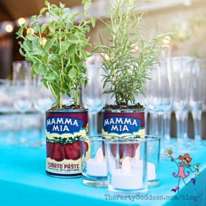 A Backyard Graduation Party To Cheer About! Planning an outdoor party? The Party Goddess, LA's best full service event planner, shares ideas from this ridiculously fabulous backyard graduation party! Check it out at https://thepartygoddess.com/backyard-graduation-party-cheer @maiasphoto #backyardgraduationparty #graduationparty #backyardparty - vintage labeled can herbs image