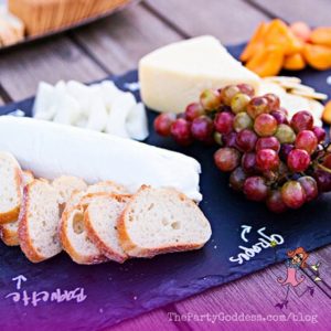 A Backyard Graduation Party To Cheer About! Planning an outdoor party? The Party Goddess, LA's best full service event planner, shares ideas from this ridiculously fabulous backyard graduation party! Check it out at https://thepartygoddess.com/backyard-graduation-party-cheer @maiasphoto #backyardgraduationparty #graduationparty #backyardparty - cheese platter image