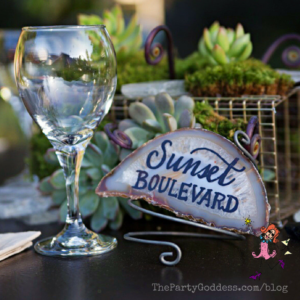 DIY Succulent Centerpieces: Be Your Own Florist! Plan ahead! The Party Goddess, LA's full service event planner, shares succulent centerpieces that you can make for a wedding or other special occasion! Check it out at https://thepartygoddess.com/diy-succulent-centerpieces-florist #maiasphoto - succulent centerpiece with agate table name image