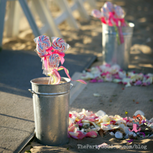 Pop The Champagne! It's Engagement Season! Here comes the bride! The Party Goddess, LA's best full service wedding planner, celebrates engagement season with a look at a gorgeous beach wedding! Check it out at https://thepartygoddess.com/pop-champagne-engagement-season #thebecker #eventplanner #eventprofs #weddings - wedding aisle image