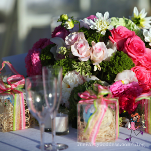 Pop The Champagne! It's Engagement Season! Here comes the bride! The Party Goddess, LA's best full service wedding planner, celebrates engagement season with a look at a gorgeous beach wedding! Check it out at https://thepartygoddess.com/pop-champagne-engagement-season #thebecker #eventplanner #eventprofs #weddings - wedding table image