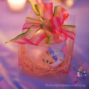 Pop The Champagne! It's Engagement Season! Here comes the bride! The Party Goddess, LA's best full service wedding planner, celebrates engagement season with a look at a gorgeous beach wedding! Check it out at https://thepartygoddess.com/pop-champagne-engagement-season #thebecker #eventplanner #eventprofs #weddings - wedding party favor image