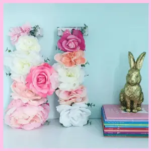 colorful flowers on an "H" letter