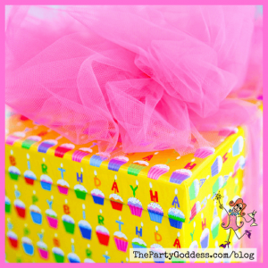 birthday present wrapped with big pink tulle bow