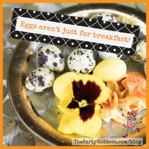 Spring Centerpieces Beyond Floral Arrangements! - centerpiece with eggs and a pansie