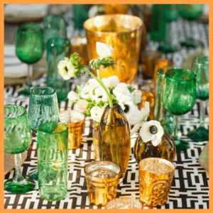 Spring Centerpieces Beyond Floral Arrangements! - colored glass tablescape