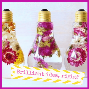 Spring Centerpieces Beyond Floral Arrangements! - flowers in lightbulb vases