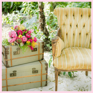 2018 Wedding Trends From Around The Globe! - vintage chair with trunks and colorful flowers