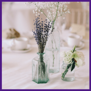Push For Purple: 16 Ultra Violet Wedding Styles - lavender and other delicate flowers in 3 glass vases