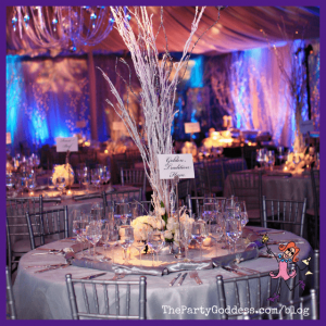 Push For Purple: 16 Ultra Violet Wedding Styles - wedding tablescape with purple and blue lighting behind