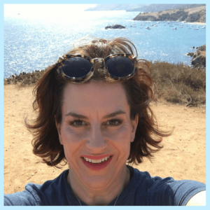2018 Travel Trends: Around The World And Back! - selfie of Marley at water's edge