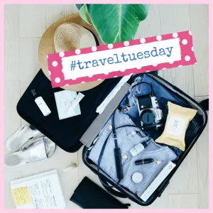 15 Best Trip Planning Hacks To Help You Save! - open suitcase with belongings