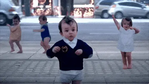 9 Fabulous New Apps For Parents And Kids! - todlers dancing on the sidewalk