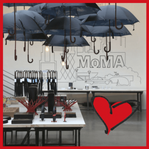 Cool Office Makeovers For Home & Businesses! - umbrellas hanging over a work table