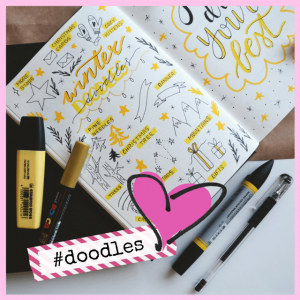 Take Note: Journals & Trackers Inspire Success! - doodles in yellow and black in a journal