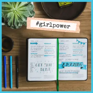 Take Note: Journals & Trackers Inspire Success! - spread of a jounal with motivational sayings