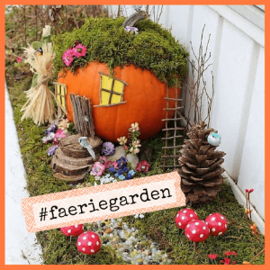 Crystal & Faerie Garden Party Ideas For Kids! - faerie garden made with a pumpkin, pinecones, rocks and wood