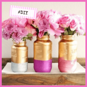We Made The List Of Top Party Planning Blogs! - 3 mason jars painted as vases filled with pink flowers