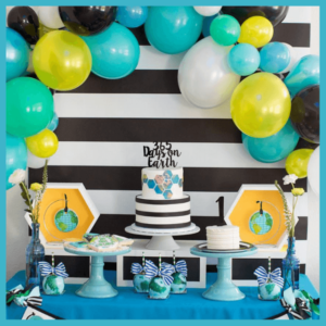 We Made The List Of Top Party Planning Blogs! - earth party theme with balloons and a dessert table