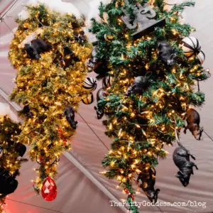Halloween: The Nutcracker And The Four Realms! - Christmas trees hanging from ceiling with rats hanging down
